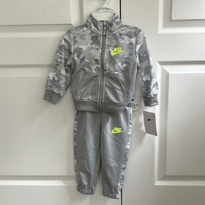 Nike zip up jogging suit. 12 months. NWT